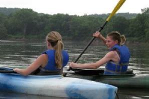 Girls Chatting and Kayaking